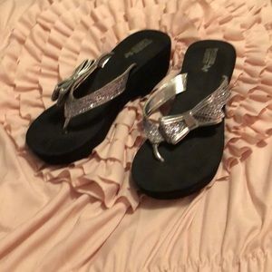 Black and silver Flip flops